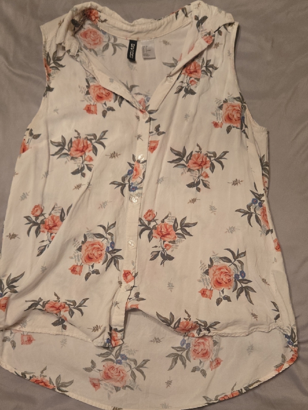 Divided White Sleeveless Button-Up Blouse with Coral Floral Print